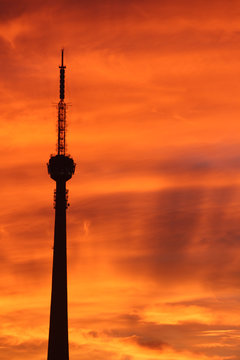 communication tower silhouette in johannesburg at sunset
