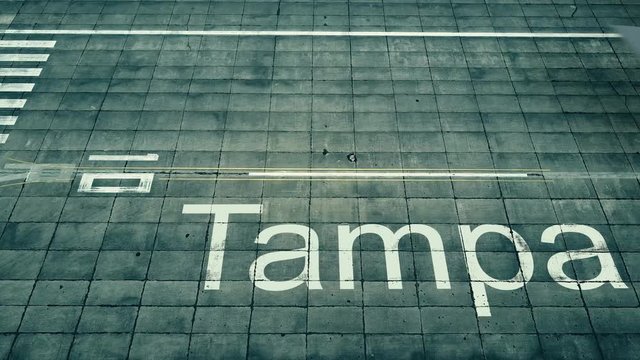 Aerial view of big airplane arriving to Tampa airport. Travel to the United States conceptual intro animation
