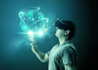 A man wearing virtual reality (VR) goggles and headset with a projection of a digital world.