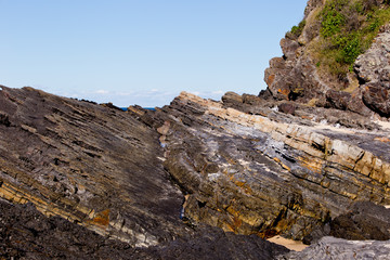 Rugged rocky coastline - Blueys Beach, New South Wales, Australia