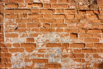 Obraz premium Old red weathered brick wall, horizontal grunge background