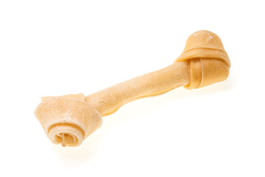 Bone artificial for dog chewing., Isolated on a white background.