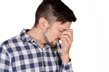 Man holding nose against bad smell.