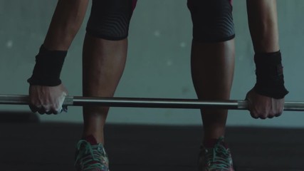 4k Cinematic Close up of a Female doing a deadlift - Powered by Adobe