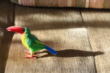 toy of tropical bird green figure