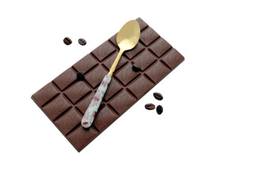 Chocolate bar, coffee beans, spoon, isolated on white background