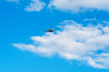 Fototapeta na wymiar helicopter on the bright summer day