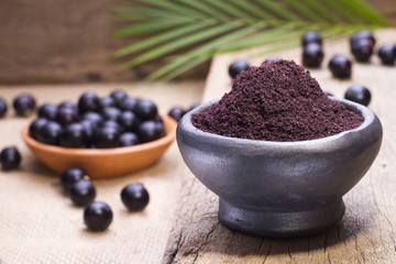 Fruits and acai powder originating from the Amazon  (Euterpe oleracea)
