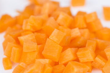 Carrot chopped into cubes ready to be used.