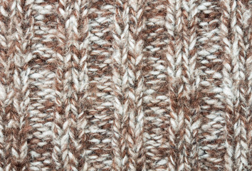 Vertical Brown Knitting or Knitted Fabric Texture Pattern Background. Knitting or Knitted Texture. Knitting Background for Design