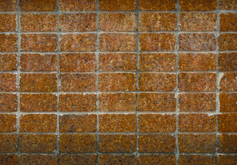 Grunge laterite wall texture.