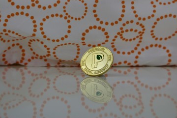 Gold peercoin coin