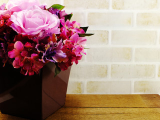 bouquets of artificial flowers with space background