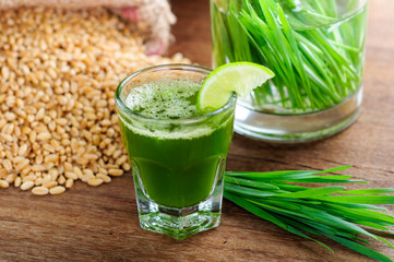 wheat grass juice on table