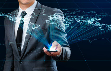 businessman using smart phone making global connection