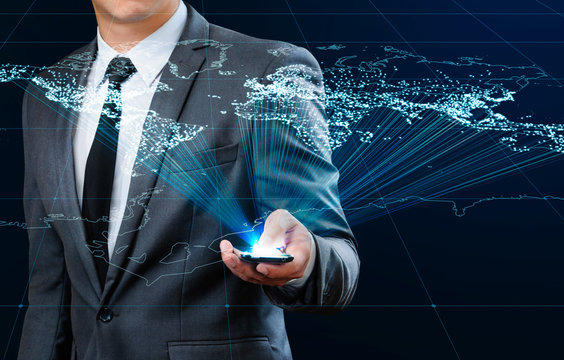 businessman using smart phone making global connection