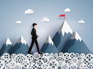   Concept of leader vision and thinking, business man walking on the gear ,paper art and craft style