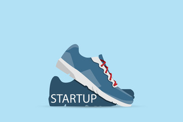 running shoes with startup word, startup and business concept