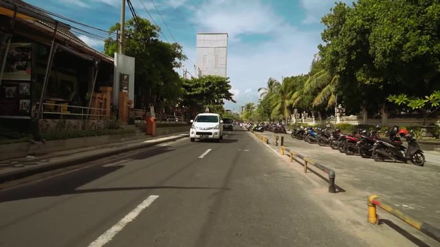 Kuta beach road shot backwards from car level, jl. Pantai Kuta, Bali