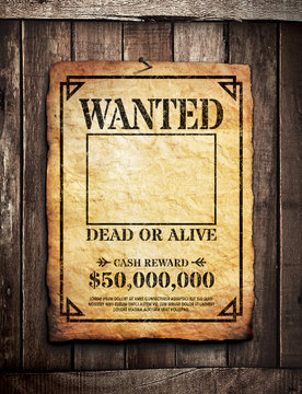 Wanted poster on wooden wall