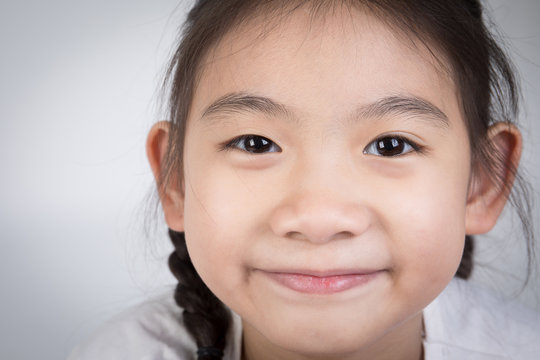 Portrait of asian cute girl with smile face
