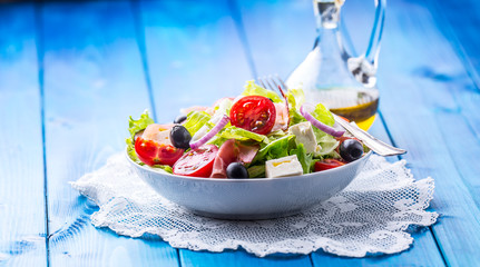 Salad. Fresh summer lettuce salad.Healthy mediterranean salad olives tomatoes parmesan cheese and...