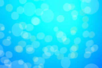 Abstract blue background with defocused bokeh, blur texture with copy space, poster for your design..