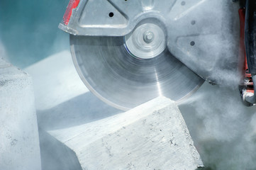 Cutting concrete block.
