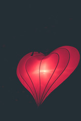 Hanging lanterns heart shape on a light festival on Bali island, Indonesia.