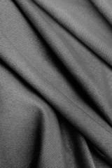 Obraz premium Wavy gray fabric, texture background