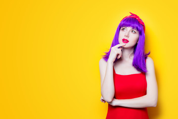 Obraz na płótnie Canvas Portrait of young girl with purple color hair