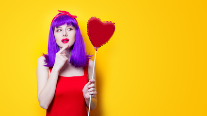 girl with purple hair with heart shape balloon