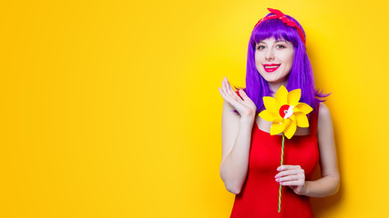 girl with pinwheel toy