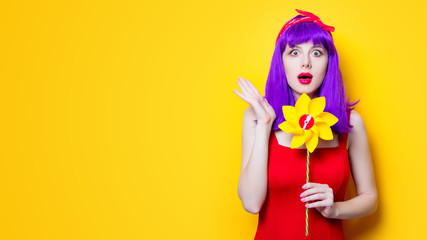 girl with pinwheel toy