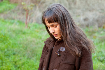 Beautiful brunette woman in the park