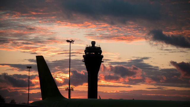 Sunset at International airport - control tower