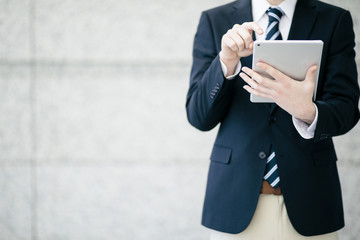 young businessman using tablet PC