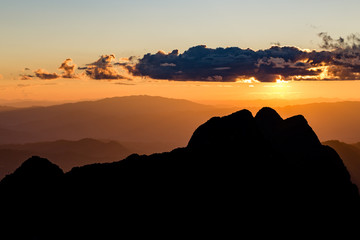 Sunset scene with silhouette mountain at Doi Luang Chiang Dao, Chiang Mai Province, Thailand