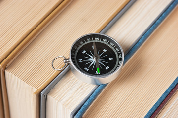 compass and old books © arbalest