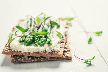 Closeup of sandwich with asparagus and fromage cheese