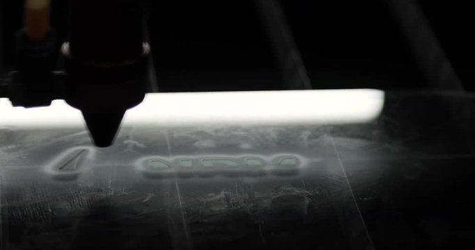 Laser cnc machine engraving design pattern on transparent acryl plate