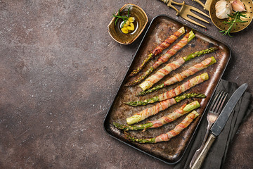 Grilled green asparagus wrapped with bacon