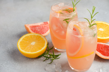 Refreshing citrus cocktail with grapefruit, orange and rosemary