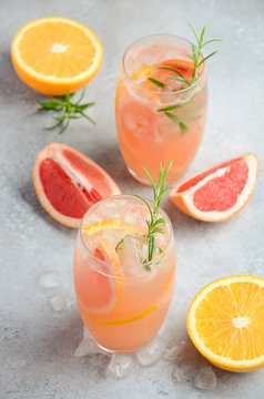 Refreshing citrus cocktail with grapefruit, orange and rosemary