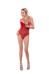 full length portrait of young beautiful blonde woman in red underwear posing isolated over white background