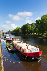 Obraz premium York UK River Ouse looking towards Skeldergate Bridge with barge