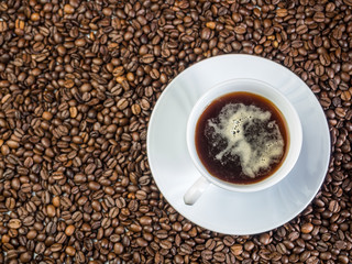 Kaffeetasse mit Kaffeebohnen