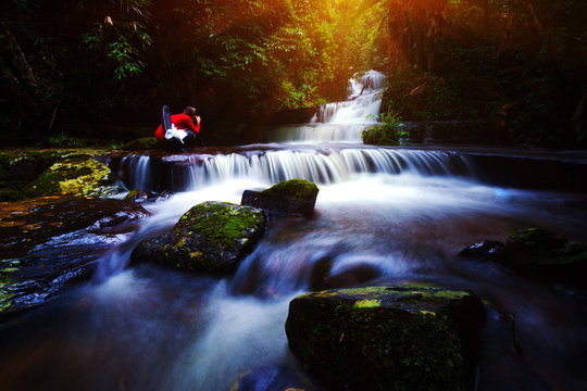 background blur Mandang waterfall in Thailand.And popular with tourists and photographers.