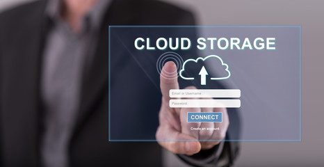 Man touching a cloud storage concept on a touch screen