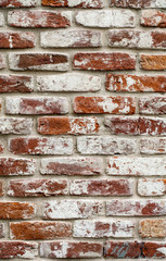 Red brick wall with white paint. texture, background, design.